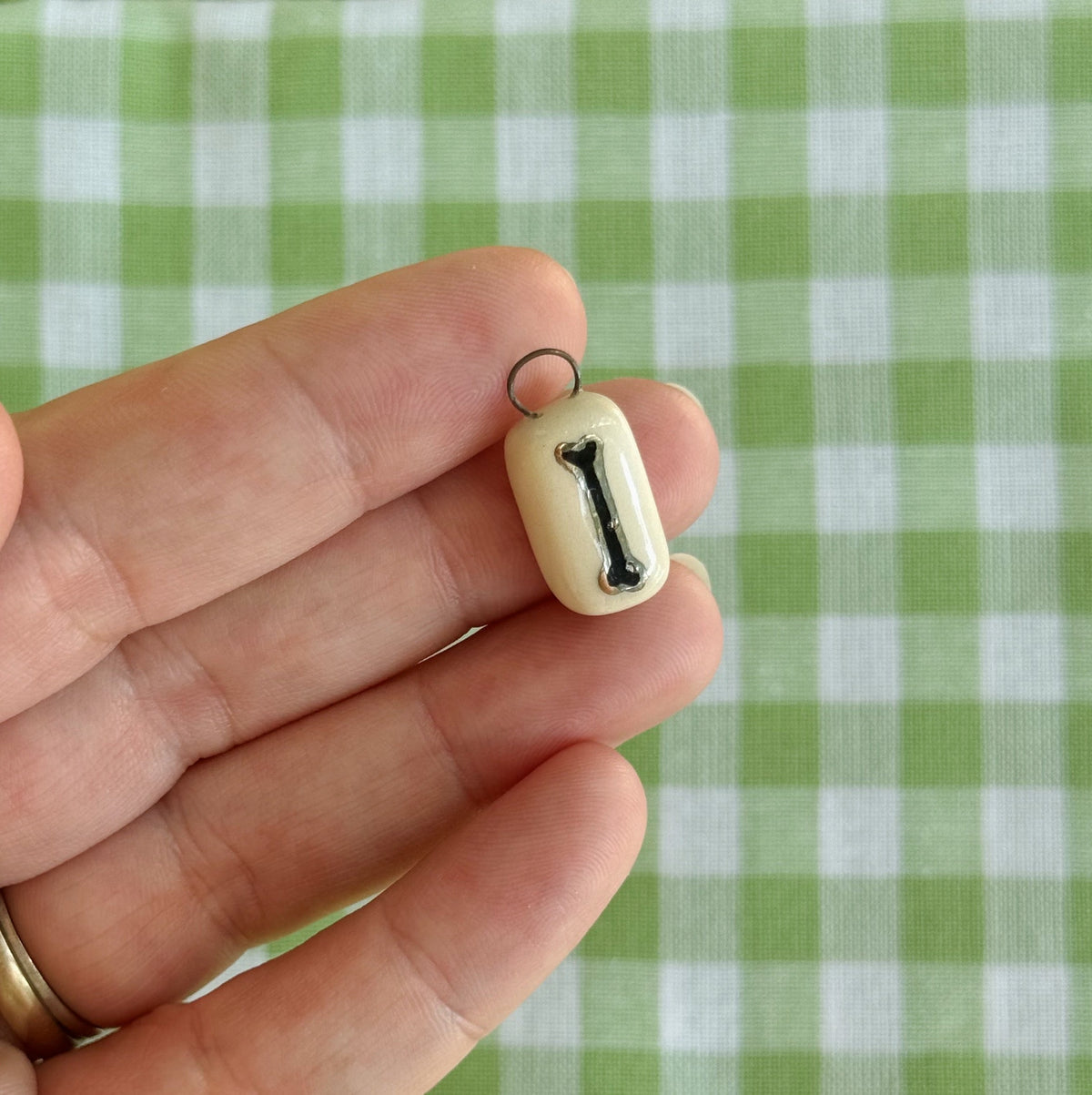 Coffin & Bone Charm